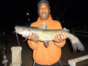 Ron Gay with 6 pound 8 ounce cat at corona lake