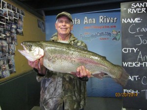 Craig Joachim of Anaheim caught a 14 pound 8 ounce trout using chartreuse Power-Bait  fishing at Sandy Beach
