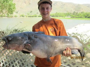 Jake Corey of Costa Mesa caught and released a 24 pound 8 ounce catfish using hot dogs at the dam