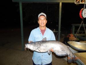 Leon Nguyen of Santa Ana caught and released a 18 pound catfish using mackerel in the Big Lake