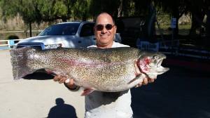 Steven Amador of La Puente just caught this 20 pound Suuuperrr Trooout at Corona Lake- He used a inflated nightcrawler from shore.