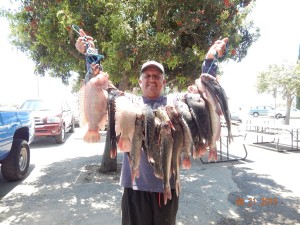 Santiago Placious of W. Covina fished back to back overnight sessions and caught 10 tilapia and 10 catfish totaling 40 pounds using night-WEB