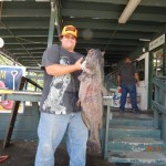 Arik Morillo of Los Angeles caught a 50 pound catfish using a hot dog fishing from shore in the Catfish Lake