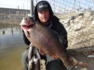 Kory Allen of Anaheim was jigging with a white minnow at the net in Chris' Pond and caught a 13 pound 13 ounce trout