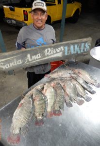 Santiago P with 14 tilapia at SARL