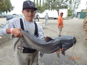 David Rochin with his 16 pound cat at sarl